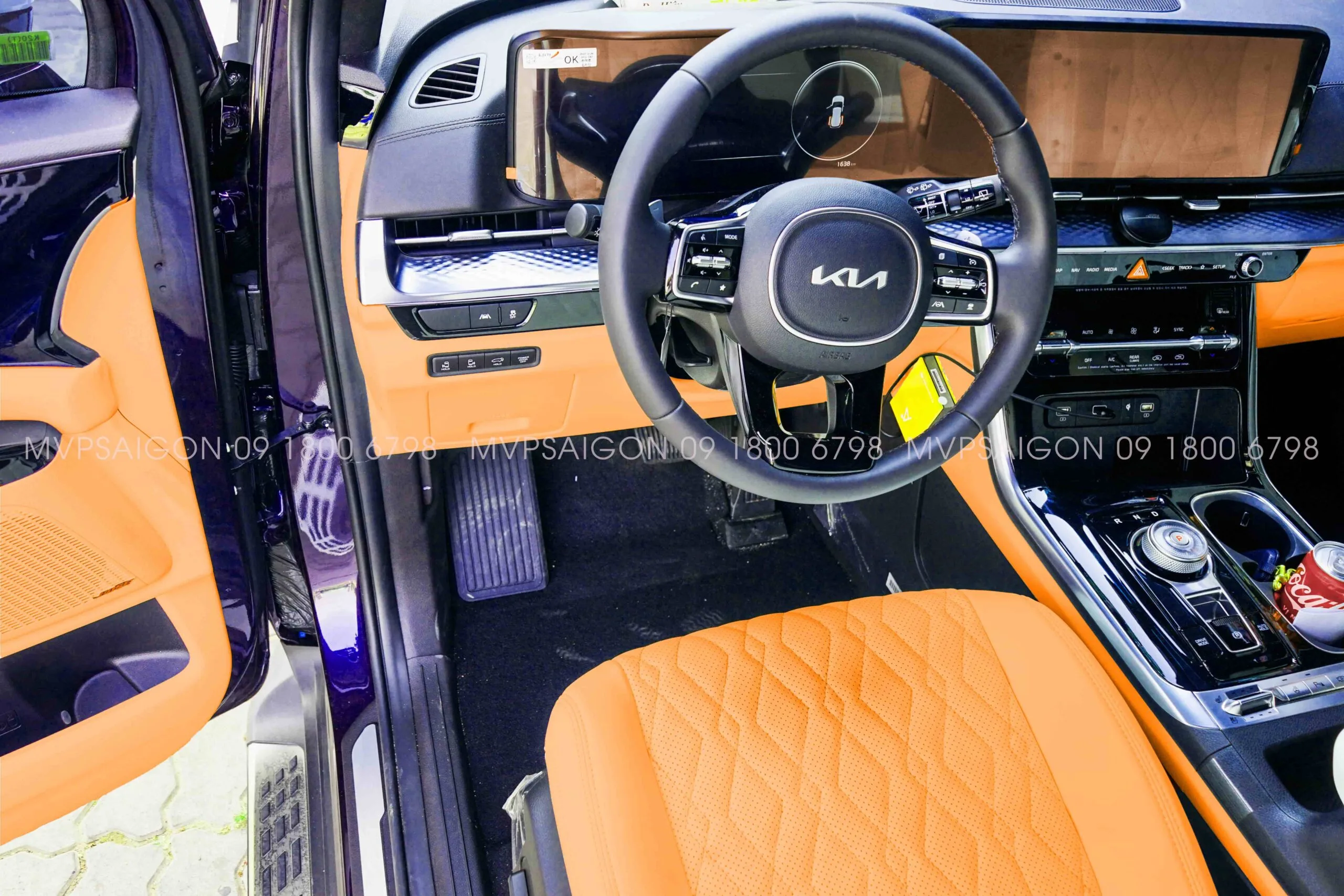 Bọc da ghế đổi màu nội thất KIA Carnival màu cam Hermes