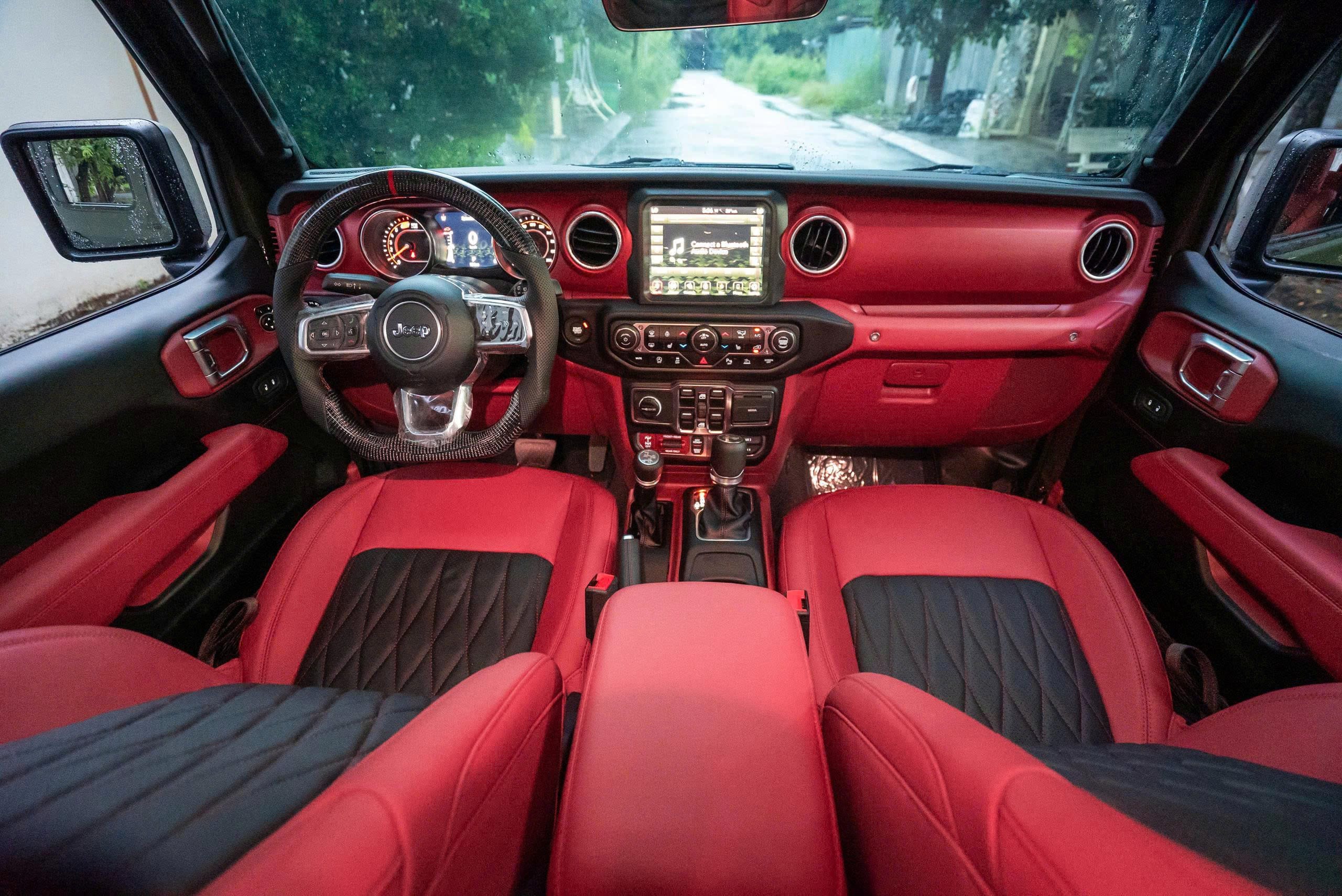 May da - khâu da- bọc da vô lăng xe Jeep